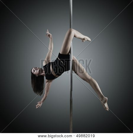 pole dancer, young woman dancing on pylon