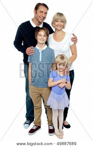 Indoor Studio Shot Of Lovely Family, Four Members