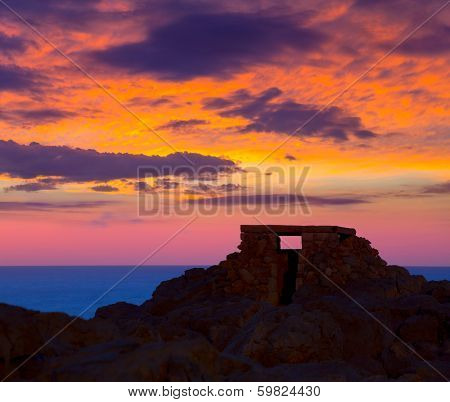 Ciutadella Menorca at Punta Nati colorful sunset in Balearic Islands