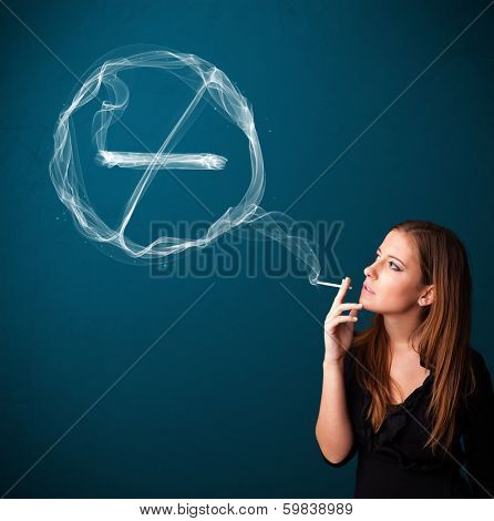 Pretty young lady smoking unheathy cigarette with no smoking sign