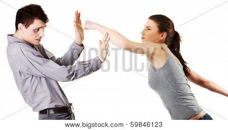 Attractive young couple fighting. Women hitting a men. Isolated on white background.