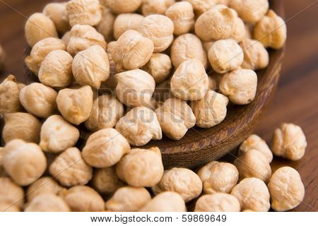 Dried White Chickpeas Ceci On The Wooden Spoon