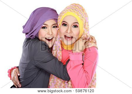 Two Beautiful Moslem Woman Having Fun Together