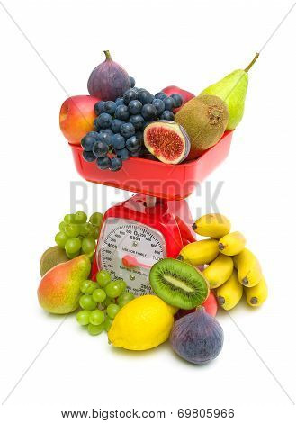 Fresh Fruit And Kitchen Scale On White Background.