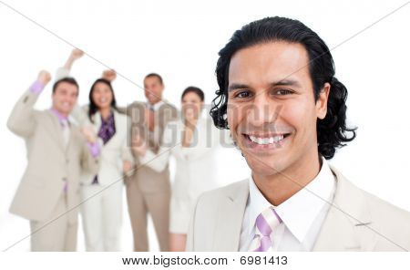 Successful Business Team Punching The Air In Celebration