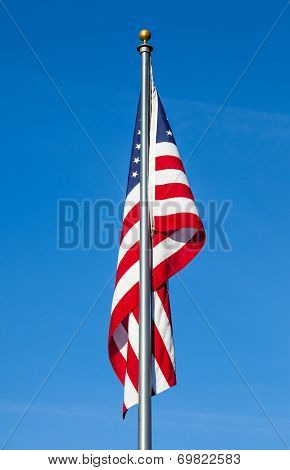 American Flag On Clear Blue Sky Background