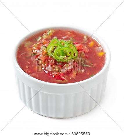 Bowl of fresh salsa dip isolated on white background