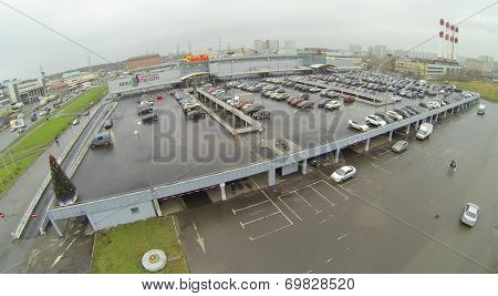MOSCOW, RUSSIA - NOVEMBER 24, 2013: Shopping Center Mall Gallery and Auchan hypermarket with a large parking area. Shopping Center opened July 28, 2005