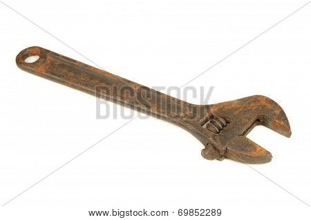 Old Rusty Adjustable Wrench (Spanner) Isolated On White Background