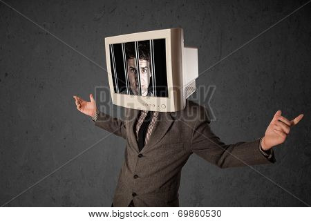 Business man with monitor screen on his head traped into a digital system concept