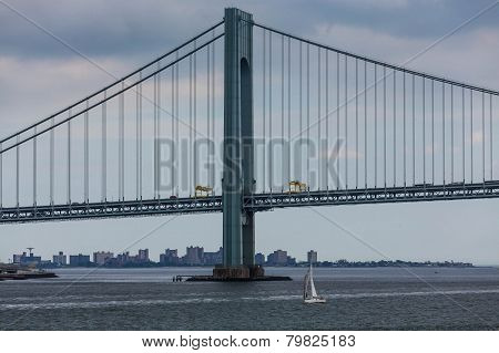 White Sailboat And Suspension Bridge