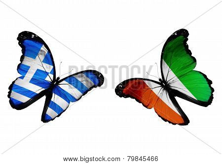 Concept - Two Butterflies With Greece And Cote Divoire Flags Flying, Like Two Football Teams Playing