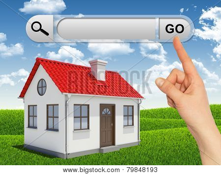 House and female hand pressing Go button at search bar above