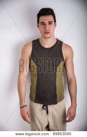 Handsome young man wearing stylish sleeveless tanktop