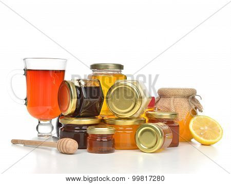 Tasty Jars Of Jam And Honey Cream Lemon And Tea