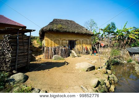 Hani ethnic minority people near their traditional house in Laocai, Vietnam