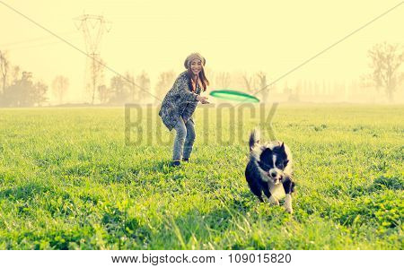 Woman Plays With Her Dog