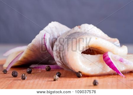 Pieces Of Herring Fillet On A Cutting Board