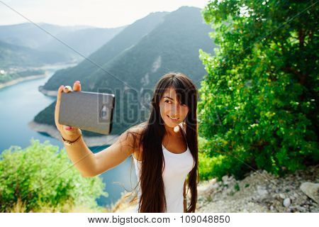 Happy Girl Taking Selfie Photo On Telephone