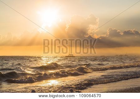 Boat And Golden Sunrise Over Ocean In Dominican Republic