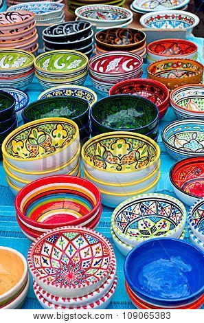 Colorful bowls with ornament, vertical