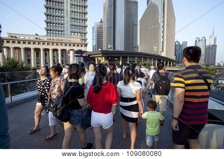 SHANGHAI, CHINA, 25 JULY, 2015:Visitors in Shanghai. Tourists in the Shanghai Lujiazui financial and Trade Zone at 25 July, 2015