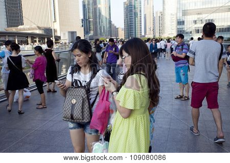 SHANGHAI, CHINA, 25 JULY, 2015:Visitors in Shanghai. Tourists in the Shanghai Lujiazui financial and Trade Zone at 25 July, 2015