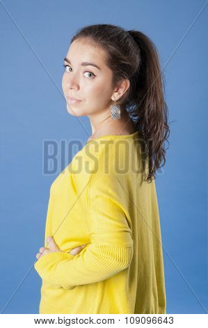 Girl In A Yellow Jacket Half-turned..