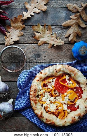 Vegetable ragout , vegetable casserole with tomato, food close up. Vegetable ragout on wood table, c