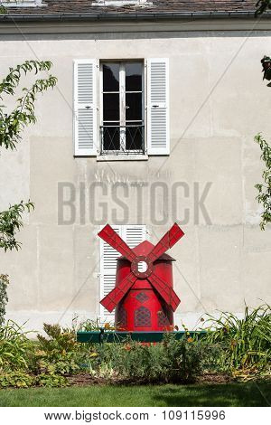 PARIS, FRANCE - SEPTEMBER 10, 2015: Paris - gardens dedicated to Auguste Renoir surround the Museum of Montmartre