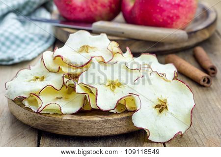 Healthy Snack. Homemade Apple Chips On Rustic Wooden Background