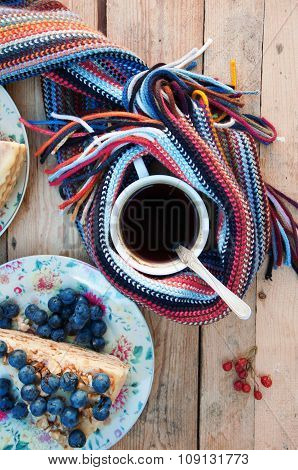 Slice of delicious cake with fresh blueberry on wooden backgroup. Piece of blueberry cake, piece of