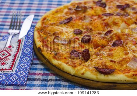 Pizza with smoked sausages