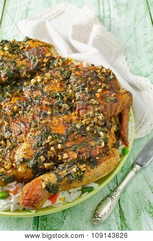Chicken Tabaka. Garnish Rice With Vegetables