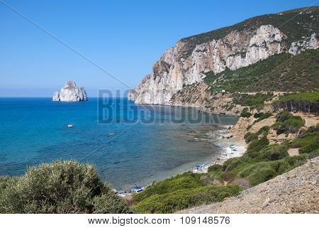 Pan di Zucchero rocks in the sea and Masua's sea stack (Nedida), Sardinia