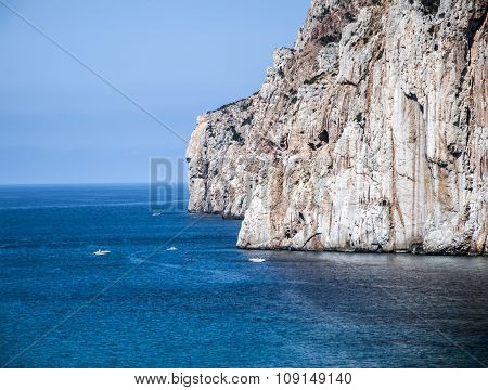 Masua's Sea Stack Daily And Some Boats In Summertime (sardinia-italy)