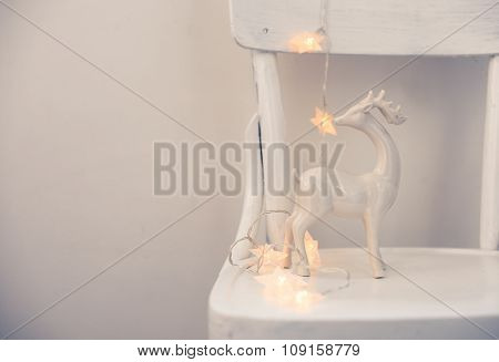 Christmas lights and ceramic deer