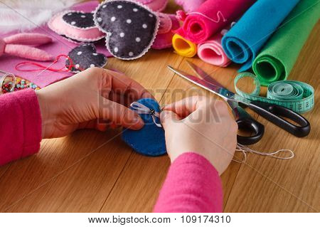 Female Hands Doing Crafts From Felt