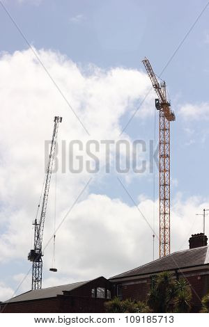Two industrial cranes