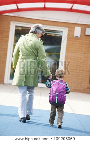 Grandmother Taking Grandson To School