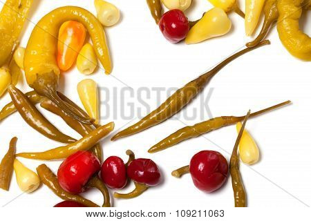 Mix Of Hot Marinated Peppers On White Background