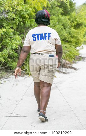 Staff Navigate For Traveler Go To The Forest  Of Half Moon Cay Park. Bahamas