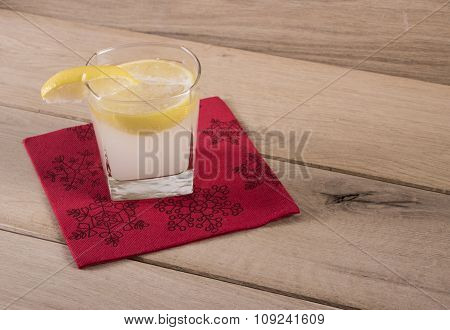 Image Of Glass Of Lemonade On Wood Background With Nepkin.