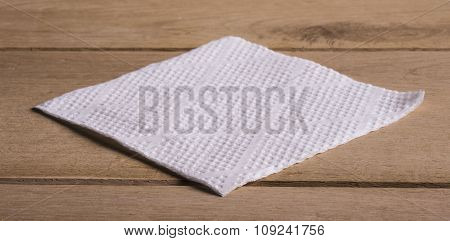 Image Of Paper Nepkin On Wood Background.