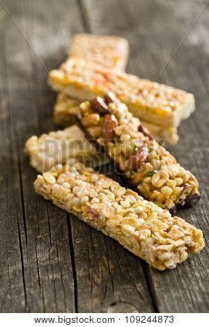 muesli bars on old wooden table