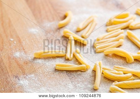 uncooked pasta casarecce with white flour