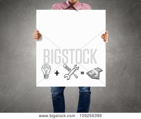 Businessman holding banner with drawn money earning concept