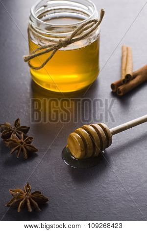 Jar of honey with spices