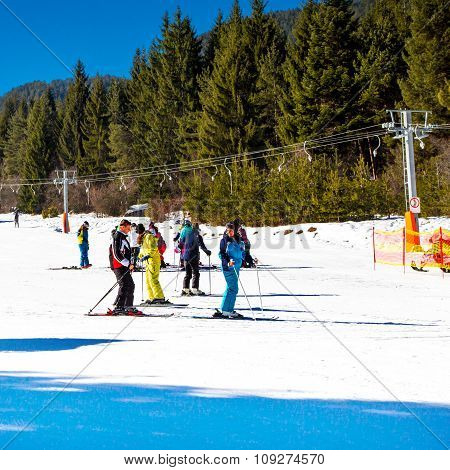 Skiers on the slope in Bansko, Bulgaria