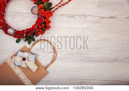 Christmas background on wooden table and copy space, shopping bag